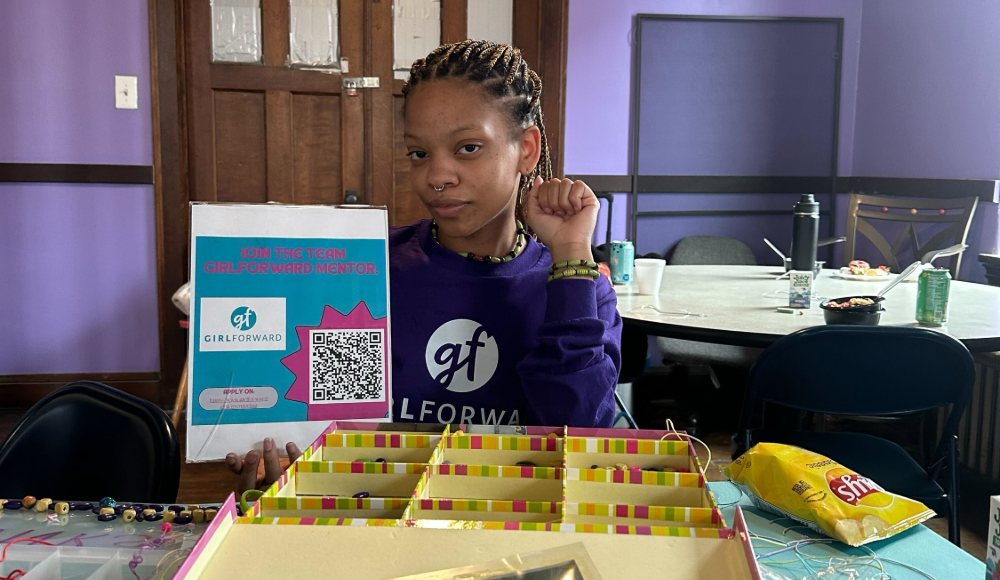 Amelie, a Loyola student, working at a GirlForward event